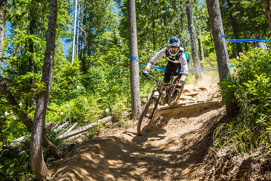 Biker racing down the mountain during the North American Enduro Cup.
