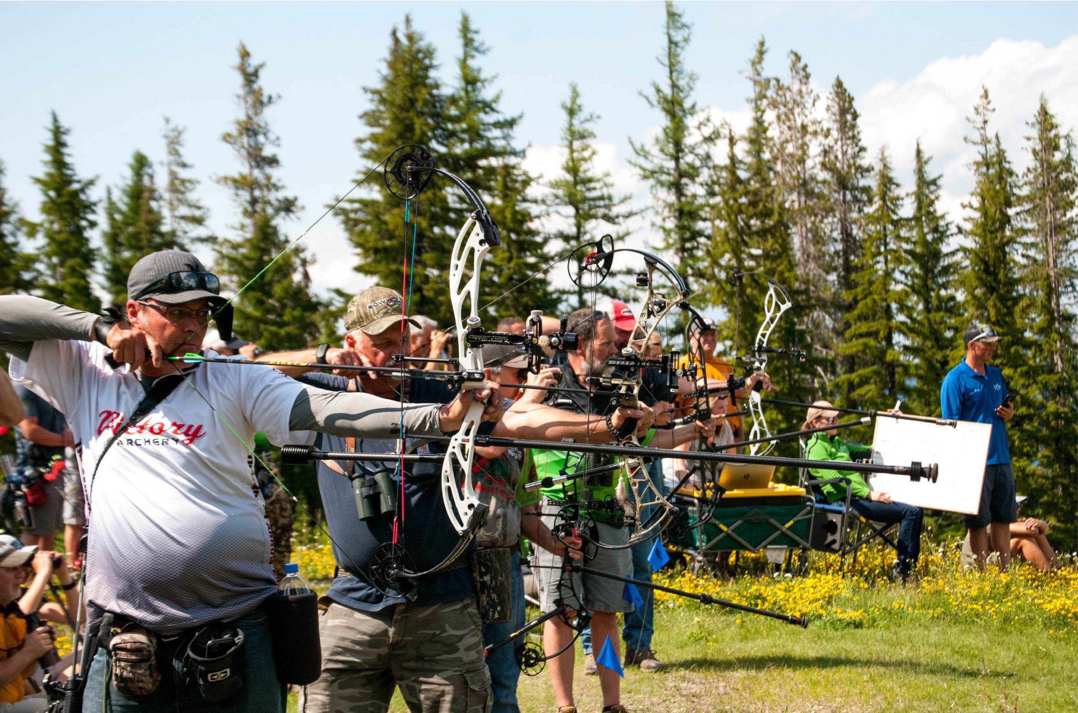 Man shooting a bow and arrow at the Silver Mountain Shootout